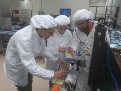 Mary and her research group in a clean room